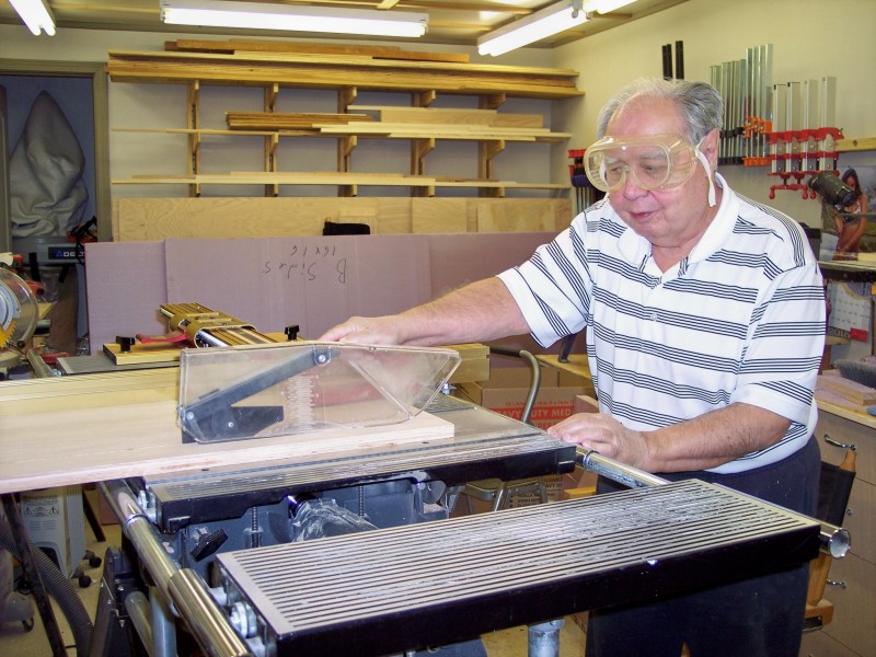 Picture of Max Robinson in his wood shop
