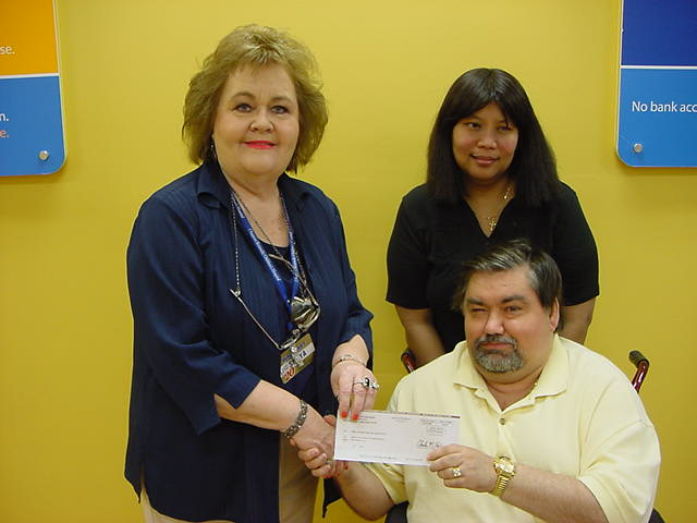 Photo of David Welch receiving Grant check