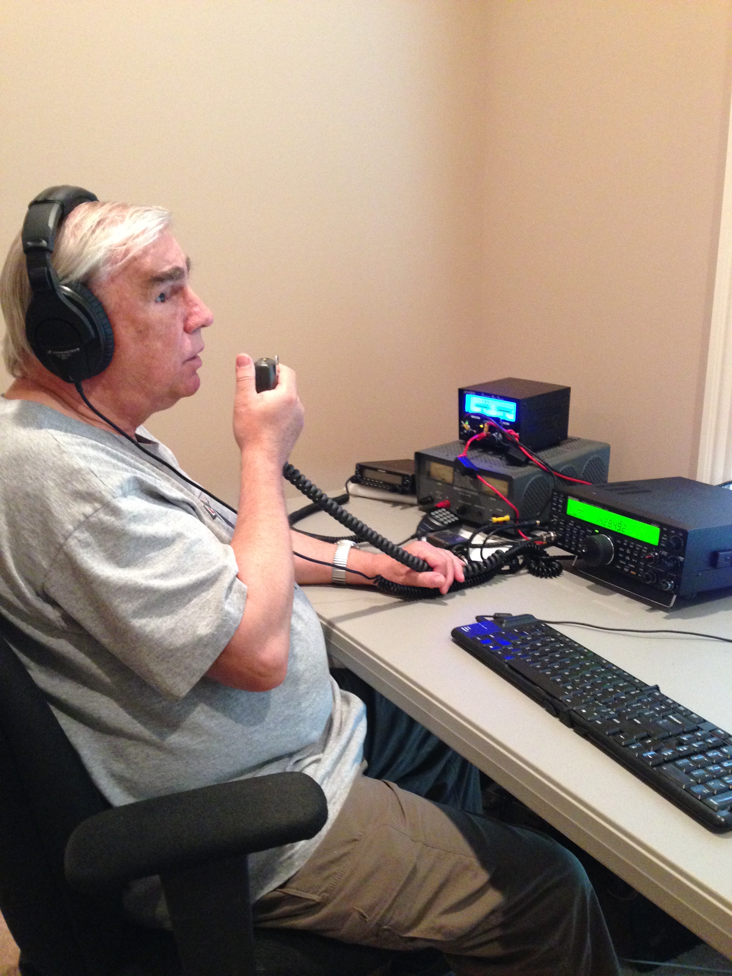 Picture of Ron at his amateur radio operating position